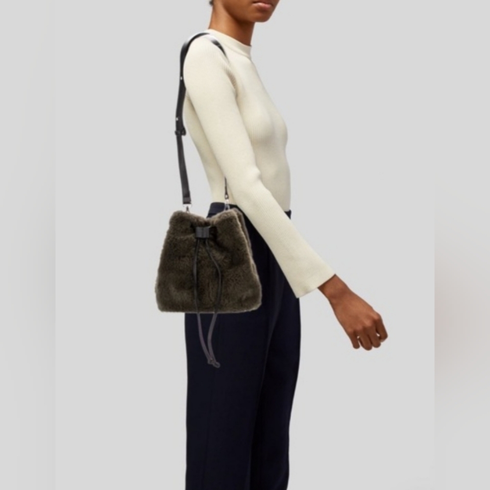 House of Harlow 1960 Elegant Black Faux Fur Drawstring Bucket Bag.